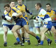 12 November 2006; Ryan McCluskey, Enniskillen Gaels., in action against Enda McGinley and Brian Mullan. AIB Ulster Senior Football Championship Quarter-Final, Errigal Chiarain v Enniskillen Gaels, Healy Park, Omagh, Co Tyrone. Picture credit: Michael Cullen / SPORTSFILE