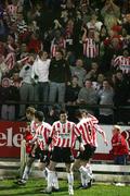 17 November 2006; Ruardhi Higgins, Derry City, celebrates with goalscorer Mark Farren, Clive Delaney, Eddie McCallion and Barry Molloy. eircom League Premier Division, Derry City v Cork City, Brandywell, Derry. Picture credit: Russell Pritchard / SPORTSFILE