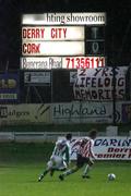 17 November 2006; Two Players under the final score at the end of the match. eircom League Premier Division, Derry City v Cork City, Brandywell, Derry. Picture credit: Russell Pritchard / SPORTSFILE