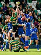 23 August 2014; James Craig, Northampton Saints, claims the ball ahead of Darragh Fanning, left, Josh van der Flier, centre, and Dominic Ryan, Leinster Pre-Season Friendly, Northampton Saints v Leinster, Franklins Gardens, Northampton, England. Picture credit: Ramsey Cardy / SPORTSFILE