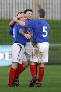 18 November 2006; Glen Ferguson, Linfield, celebrates with his team mates Michael Gault and Willia Murphy. Carnegie Premier League, Donegal Celtic v Linfield, Suffolk Road, Belfast, Co. Antrim. Picture credit: Russell Pritchard / SPORTSFILE