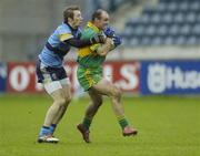 19 November 2006; David Bannon, Rhode, is tackled by Billy Sheehan, UCD, AIB Leinster Club Senior Football Championship Semi-Final, UCD v Rhode, Parnell Park, Dublin. Picture credit: Damien Eagers / SPORTSFILE