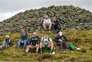 24 August 2014; Andrew Fahey, Clare, stops for a lunch break before the descent down the mountain. M. Donnelly All-Ireland Poc Fada Final. Annaverna Mountain, Ravensdale, Cooley, Co. Louth. Picture credit: Piaras Ó Mídheach / SPORTSFILE