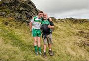 24 August 2014; Andrew Fahey, Clare, with Poc Fada sponsor Martin Donnelly during the M. Donnelly All-Ireland Poc Fada Final. Annaverna Mountain, Ravensdale, Cooley, Co. Louth. Picture credit: Piaras Ó Mídheach / SPORTSFILE