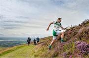 24 August 2014; Brendan Cummins, Tipperary, makes his way up the mountain to take his next shot during the M. Donnelly All-Ireland Poc Fada Final. Annaverna Mountain, Ravensdale, Cooley, Co. Louth. Picture credit: Piaras Ó Mídheach / SPORTSFILE