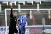 25 November 2006; Referee Stephen Moore shows the yellow card to Adrian Harper, Glenavon. Carnegie Premier League, Glentoran v Glenavon, The Oval, Belfast. Picture credit:  Russell Pritchard / SPORTSFILE