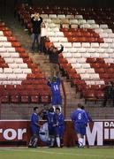 25 November 2006; Goalscorer Paul Walsh, Glenavon, runs over to fans to celebrate,  Carnegie Premier League, Glentoran v Glenavon, The Oval, Belfast. Picture credit:  Russell Pritchard / SPORTSFILE