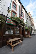 29 August 2014; Kerry and Mayo flags fly outside Flannery's Bar on the Cecil Street in Limerick City ahead of the GAA Football All-Ireland Senior Championship Semi-Final Replay between Kerry and Mayo. Picture credit: Diarmuid Greene / SPORTSFILE