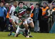 26 November 2006; Alesana Tuilagi, The Pacific Islands, is tackled by Shane Horgan and Peter Stringer, Ireland. Autumn Internationals, Ireland v The Pacific Islands, Lansdowne Road, Dublin. Picture credit: Brian Lawless / SPORTSFILE