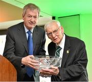 30 August 2014; Ard Stiúrthóir of the GAA Páraic Duffy, left, makes a presentation of a Shamrock Bowl to Dan Rooney, owner of the Pittsburgh Steelers during the President's Lunch ahead of the game. Croke Park Classic 2014, Penn State v University of Central Florida. Croke Park, Dublin. Picture credit: Brendan Moran / SPORTSFILE