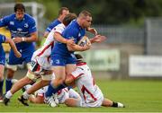 30 August 2014; Cian Healy, Leinster, is tackled by Sean Reidy and Rob Herring, Ulster. Pre-Season Friendly, Leinster v Ulster. Tallaght Stadium, Tallaght, Co. Dublin. Picture credit: Matt Browne / SPORTSFILE