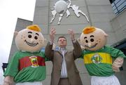 4 December 2006; Mayo manager John O'Mahony with RUA from Kerry and Mayo at the launch of 'RUA', the new children's GAA mascot created by Sports Merchandising Ireland Ltd. RUA is a soft toy which comes decked out in your favourite county colours and is available now. Croke Park, Dublin. Picture credit: Pat Murphy / SPORTSFILE