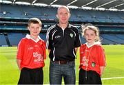 31 August 2014; Referees Niamh McAloon, and Oisin O'Loughlin, both from St. Columban's Primary School, Belcoo, Fermanagh with a representative from Cummann na mBunscol. INTO/RESPECT Exhibition GoGames. Croke Park, Dublin. Picture credit: Ramsey Cardy / SPORTSFILE