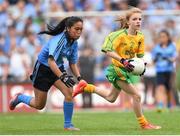 31 August 2014; Tara Bedford, Rathmore N.S, Kildare, representing Donegal, in action against Janice Singson, Holy Child N.S, Larkhill Road, Dublin, representing Dublin, during the INTO/RESPECT Exhibition GoGames. Croke Park, Dublin. Picture credit: Stephen McCarthy / SPORTSFILE