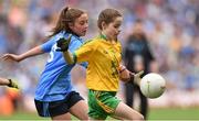 31 August 2014; Emma Dunphy, Scoil an Chroí Ró Naofa, Kilkenny, representing Donegal, in action against Lisa Walsh, Ballylinan N.S, Laois, representing Dublin, during the INTO/RESPECT Exhibition GoGames. Croke Park, Dublin. Picture credit: Stephen McCarthy / SPORTSFILE