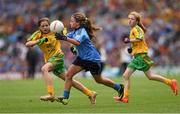31 August 2014; Donna Hannafin, St. Matthews N.S, Longford, representing Dublin, in action against Hannah-Kate Murphy, Killean Primary School, Down, representing Donegal, during the INTO/RESPECT Exhibition GoGames. Croke Park, Dublin. Picture credit: Stephen McCarthy / SPORTSFILE