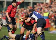 27 December 2006; Frankie Sheahan, with Ian Dowling, left, Munster, is tackled by Brian O'Driscoll and Gordon D'Arcy, Leinster. Magners League, Munster v Leinster, Thomond Park, Limerick. Picture credit: Kieran Clancy / SPORTSFILE