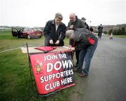 7 January 2007; Seamus McLean, Public Relations Officer of the Down Supporters Club, signs up some new supporters before the game. Gaelic Life Dr. McKenna Cup, Section C, First Round, Down v Antrim, Thomas Russell Park, Downpatrick, Co Down. Picture credit: Oliver McVeigh / SPORTSFILE