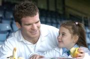 8 January 2007; Ireland Rugby International Gordon D'Arcy with Angel Lowry, aged 8, from Gaelscoil Cholaiste Mhuire, Dublin, at the launch of 'SuperValu Kids in Action Programme'. This new scheme will teach children how to live a healtheir lifestyle. To facilitate all children, over one million euro worth of sports equipment will be distributed to all primary and special needs schools nationwide. Croke Park, Dublin. Picture credit: David Maher / SPORTSFILE