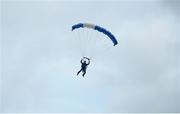 30 August 2014; Parachutist Colin Curran arrives in Croke Park in the Penn State colours. Croke Park Classic 2014, Penn State v University of Central Florida. Croke Park, Dublin. Picture credit: Brendan Moran / SPORTSFILE
