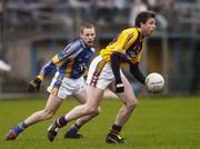 13 January 2007; Paul Earls, Wicklow, in action against Diarmuid Kinsella, Wexford. O'Byrne Cup Quarter Final, Wicklow v Wexford, County Park, Aughrim, Co. Wicklow. Photo by Sportsfile *** Local Caption ***