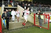 14 January 2007; Colm Cavanagh and Brendan Boggs, Tyrone, take to the field against Derry. McKenna Cup, Section B, 2nd Round, Tyrone v Derry, Healy Park, Omagh, Co Tyrone. Picture credit: Oliver McVeigh / SPORTSFILE