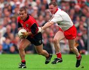 28 July 1996; James McCartan of Down gets away from Chris Lawn of Tyrone during the Ulster Senior Football Championship Final between Tyrone and Down at St. Tiernach's Park in Clones. Photo by David Maher/Sportsfile