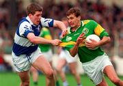 20 April 1997; Maurice Fitzgerald of Kerry in action against Colm Burke of Laois during the National Football League Semi Final between Kerry and Laois at Croke Park in Dublin. Photo by David Maher/Sportsfile