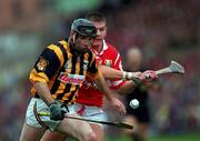 12 September 1999; DJ Carey of Kilkenny in action against Diarmuid O'Sullivan of Cork during the Guinness All-Ireland Senior Hurling Championship Final between Cork and Kilkenny at Croke Park in Dublin. Photo by Ray McManus/Sportsfile