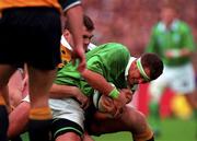 10 October 1999; Dion O'Cuinneagain of Ireland in action against Daniel Herbert of Australia during the Rugby World Cup Pool E match between Ireland and Australia at Lansdowne Road in Dublin. Photo by Brendan Moran/Sportsfile