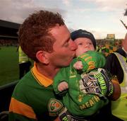 26 September 1999; Donal Curtis of Meath celebrates his side's victory with his nephew following the Bank of Ireland All-Ireland Senior Football Championship Final match between Meath and Cork at Croke Park in Dublin. Photo by Ray Lohan/Sportsfile