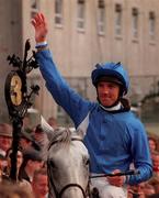 11 September 1999; Jockey Frankie Dettori, onboard Daylami, acknowledges the crowd after winning the Esat Digifone Champion Stakes at Leopardstown Racecourse in Dublin. Photo by Damien Eagers/Sportsfile