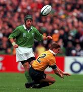 10 October 1999; David Humphreys of Ireland in action against Tim Horan of Australia during the Rugby World Cup Pool E match between Ireland and Australia at Lansdowne Road in Dublin. Photo by Matt Browne/Sportsfile