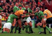 10 October 1999; Joe Roff of Australia is tackled by David Humphries and Keith Wood, 2, of Ireland during the Rugby World Cup Pool E match between Ireland and Australia at Lansdowne Road in Dublin. Photo by Matt Browne/Sportsfile