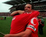 12 September 1999; Cork's John Browne celebrates with manager Jimmy Barry Murphy  following the Guinness All-Ireland Senior Hurling Championship Final between Cork and Kilkenny at Croke Park in Dublin. Photo by David Maher/Sportsfile