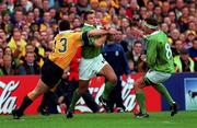 10 October 1999; Justin Bishop of Ireland in action against Daniel Herbert of Australia during the Rugby World Cup Pool E match between Ireland and Australia at Lansdowne Road in Dublin. Photo by Brendan Moran/Sportsfile