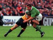 10 October 1999; Justin Bishop of Ireland in action against Tim Horan of Australia during the Rugby World Cup Pool E match between Ireland and Australia at Lansdowne Road in Dublin. Photo by Brendan Moran/Sportsfile