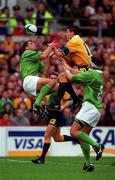 10 October 1999; Justin Bishop of Ireland in action against Matt Burke of Australia during the Rugby World Cup Pool E match between Ireland and Australia at Lansdowne Road in Dublin. Photo by Brendan Moran/Sportsfile