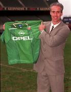 5 February 1996; Newly appointed Republic of Ireland manager Mick McCarthy poses with a Republic of Ireland jersey at Lansdowne Road in Dublin. Photo by David Maher/Sportsfile