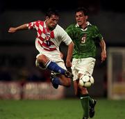 4 September 1999; Robert Kovac of Croatia in action against Tony Cascarino of Ireland during the UEFA European Championships Qualifying Group 8 match between Croatia and Republic of Ireland at Maksimir Stadium in Zagreb, Croatia. Photo by Brendan Moran/Sportsfile