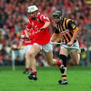 12 September 1999; Timmy McCarthy of Cork in action against Peter Barry of Kilkenny during the Guinness All-Ireland Senior Hurling Championship Final between Cork and Kilkenny at Croke Park in Dublin. Photo by Brendan Moran/Sportsfile