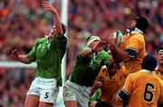 10 October 1999; Toutai Kefu of Australia gathers the ball from ahead of Trevor Brennan and Malcolm O'Kelly, left, of Ireland during the Rugby World Cup Pool E match between Ireland and Australia at Lansdowne Road in Dublin. Photo by Brendan Moran/Sportsfile