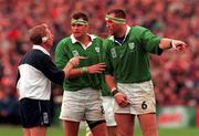 10 October 1999; Ireland's Trevor Brennan, right, and captain Dion O'Cuinneagain in discussion with referee Clayton Thomas during the Rugby World Cup Pool E match between Ireland and Australia at Lansdowne Road in Dublin. Photo by Matt Browne/Sportsfile
