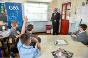 9 September 2014; Uachtarán Chumann Lúthchleas Gael Liam Ó Néill with children from O'Connell CBS Primary School at the launch of PE Céim ar Aghaidh Teaching Resource Book. O’Connell CBS Primary School, North Circular Road, Dublin. Photo by Sportsfile