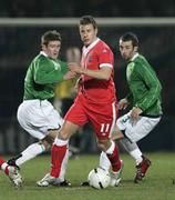 6 February 2007; Paul Parry, Wales, in action against Tony Capaldi, left, and Steve Davis, Northern Ireland. International friendly, Northern Ireland v Wales, Windsor Park, Belfast, Co. Antrim. Picture Credit: Russell Pritchard / SPORTSFILE