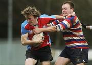 7 February 2007; Conor Hendricks, C.U.S., is tackled by Johnny Molloy, Templeogue. Vinnie Murray Semi Final, Templeogue College v C.U.S, Kilternan. Picture Credit: Pat Murphy / SPORTSFILE