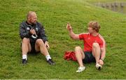 15 September 2014; Ireland scrum coach Greg Feek, left, and Munster scrum coach Jerry Flannery in conversation after squad training ahead of their side's Guinness PRO12, Round 3, match against Zebre on Friday. Munster Rugby Squad Training, University of Limerick, Limerick. Picture credit: Diarmuid Greene / SPORTSFILE
