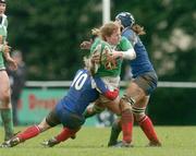 10 February 2007; Fiona Coghlan, Ireland, is tackled by Estelle Sartini, left, and Delphine Plantet, France. Women's Six Nations Rugby, Ireland v France, Templeville Road, Dublin. Picture Credit: Pat Murphy / SPORTSFILE
