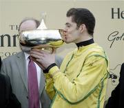10 February 2007; Andrew McNamara kisses the trophy after his victory aboard Beef Or Salmon in The Hennessy Cognac Gold Cup at Leopardstown. Leopardstown Racecourse, Leopardstown, Dublin. Picture credit: SPORTSFILE
