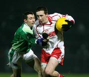 10 February 2007; Colm Cavanagh, Tyrone, in action against Raymond Johnston, Fermanagh. Allianz National Football League, Division 1A, Round 2, Tyrone v Fermanagh, Healy Park, Omagh, Co. Tyrone. Picture Credit: Oliver McVeigh / SPORTSFILE